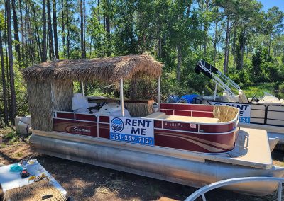 Side view of Tiki Pontoon Party Boat Orange Beach Alabama - Toon Tiki Party Boat Rental